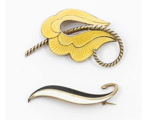 Two Albert Scharning of Oslo Norwegian silver gilt and enamel brooches, one in the form of a leaf with black and white enamel
