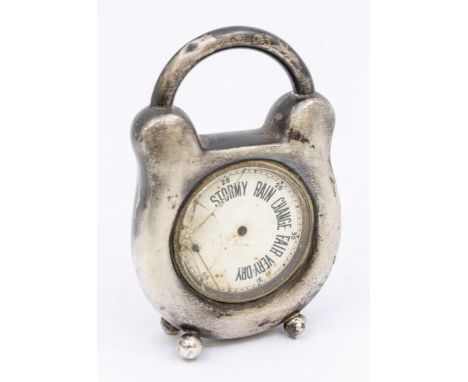 An Edwardian novelty silver cased barometer, the case padlock shaped on four ball feet, hallmarked by Grey &amp; Co, London, 
