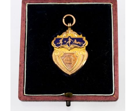 Football: A 9ct gold and enamel football medal, hallmarked 'Vaughton &amp; Sons, Birmingham, 1907'. Gross weight approx. 9.3g