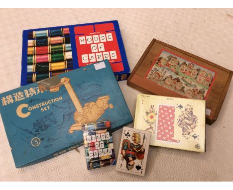 A collectors lot to include medium size House of Cards, designed by Charles Eames, playing card size House of Cards, Chinese 