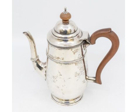 A George V silver coffee pot, egg-and-dart border, fruitwood handle and finial, hallmarked by Adie Brothers, Birmingham, 1923