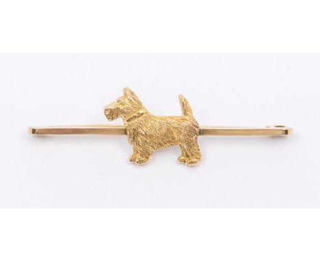 A Vintage 9ct gold bar brooch in the form of Scottie dog, length approx 50mm, marked 375, weight approx 2.9gms Further detail