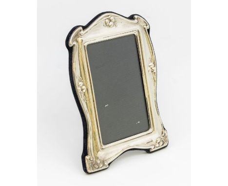 An Art Nouveau style silver photograph frame, easel back, the silver hallmarked by John Bull Ltd, Birmingham, 1988