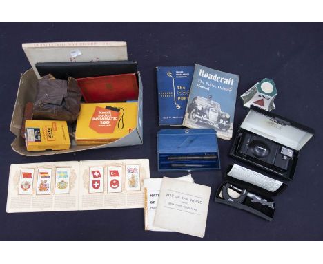 A collectors lot including a Brownie camera, Kodak camera, Bass ceramic vesta, advertising pot, collection of pens, Odhams ow