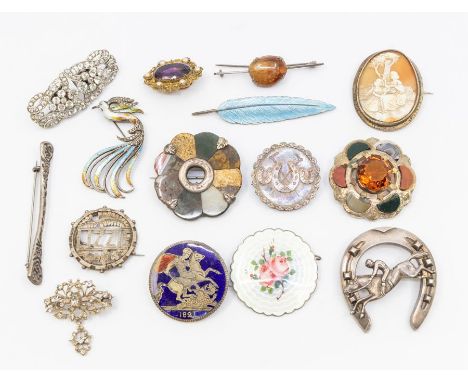 A collection of 15 antique & vintage brooches to include a Scottish hardstone brooches including silver versions, along with 
