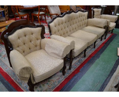 A reproduction three piece suite, comprising three seat sofa and two armchairs