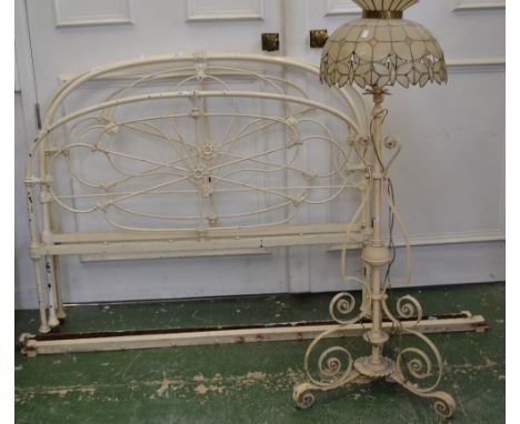 A wrought iron standard lamp; an iron double bed; an iron bed head (6)