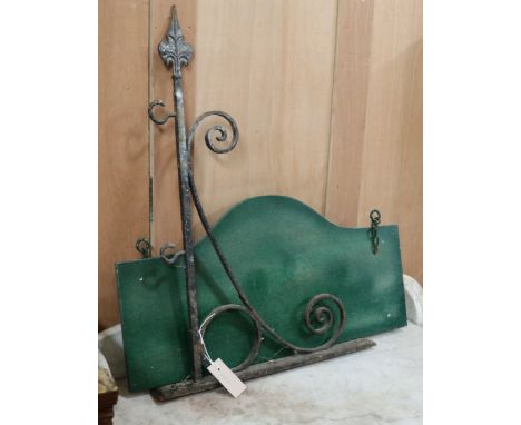 A sign and iron bracket W.64cm