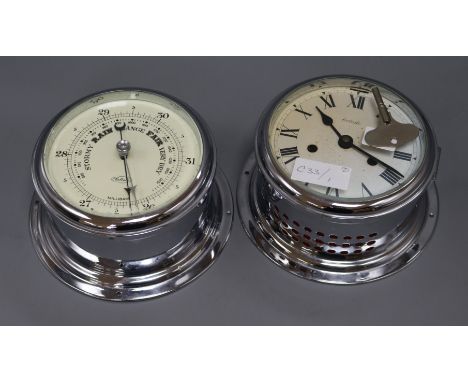 A ship's clock and barometer