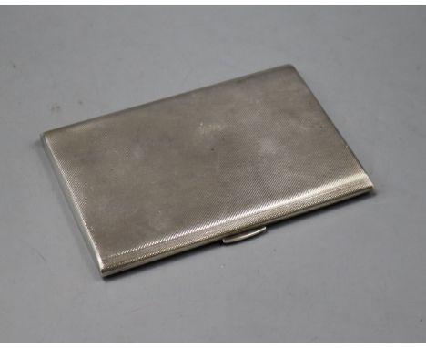 A 1960's engine turned silver cigarette case, 12.5cm, gross 5 oz.