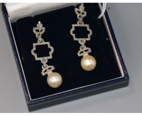 A pair of 1920's/1930's white metal, diamond and cultured pearl set openwork drop earrings, 48mm.