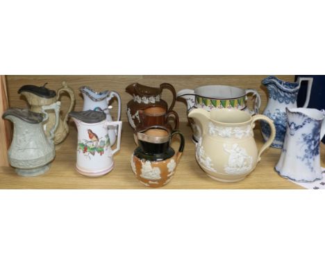 A quantity of assorted Victorian and other ceramic jugs including Doulton