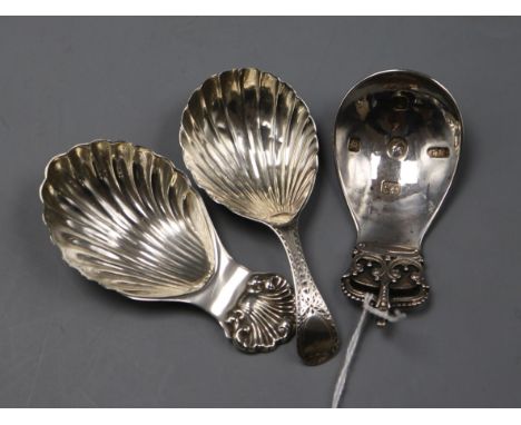 A 1950's silver Coronation caddy spoon by Robert Edgar Stone and two other silver caddy spoons including 19th century.