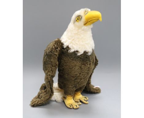 A Steiff Bald Eagle, with flags, Last Frontier and bag