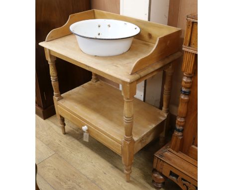 A Victorian pine wash stand with ceramic bowl W.77cm
