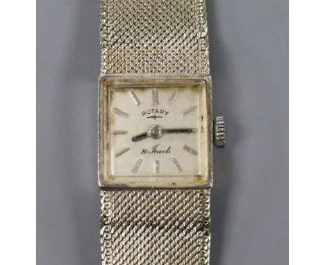 A lady's 9ct white gold Rotary manual wind wrist watch on integral 9ct white gold bracelet.