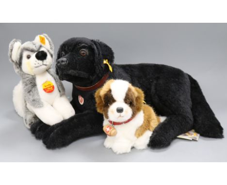 Four Steiff yellow tag toys: Bernie Dog, Scotty Huskie, Lumpi Labrador and Skye Terrier