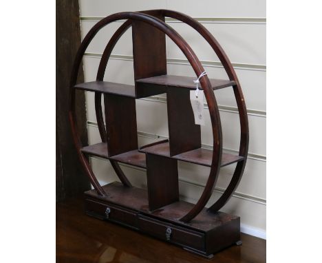 A Chinese hardwood circular shelf stand W.51cm