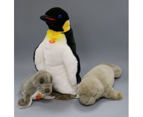 Three Steiff yellow tag toys: Manatee, Charly 40 Penguin and Cosy Robby Seal