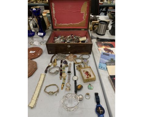 A LARGE QUANTITY OF COSTUME JEWELLERY TO INCLUDE WATCHES, RINGS, BANGLES, BRACELETS, NECKLACES, BROOCHES, ETC IN A VINTAGE OA