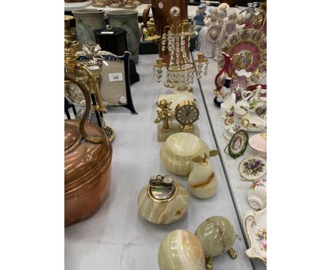 A QUANTITY OF ONYX ITEMS TO INCLUDE A TABLE LIGHTER, DECORATIVE EGGS, A MANTLE CLOCK, CANDLESTICKS, ETC 
