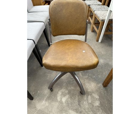 A VINTAGE METAL FRAMED SWIVEL CHAIR 