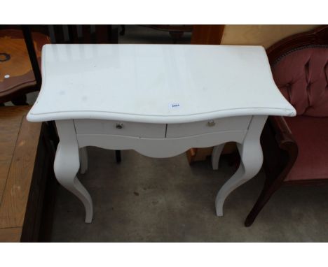 A WHITE TWO DRAWER SERPENTINE FRONTED CONSOLE TABLE, 33" WIDE 