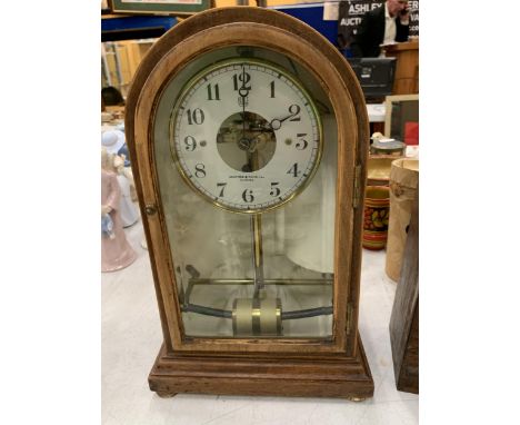 AN ASHFORD AND DAVIES BULLE TURBINE, 1920'S MANTLE CLOCK, VENDOR STATES IN WORKING ORDER, NO WARRANTY GIVEN 