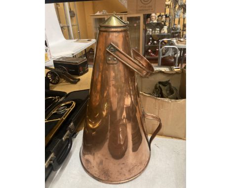 AN ARTS AND CRAFTS COPPER FLASK WITH HINGED BRASS LID AND COPPER HANDLE TO TOP AND SIDE 49 CM 