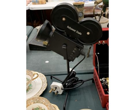 A VINTAGE HOLLYWOOD STUDIO LAMP IN WORKING ORDER - NO WARRANTY GIVEN 
