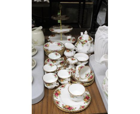 A ROYAL ALBERT "OLD COUNTRY ROSES" TEA SERVICE TO INCLUDE A THREE TIER CAKE STAND, TEA POT, JUG, SUGAR BOWL PLUS CUPS AND SAU