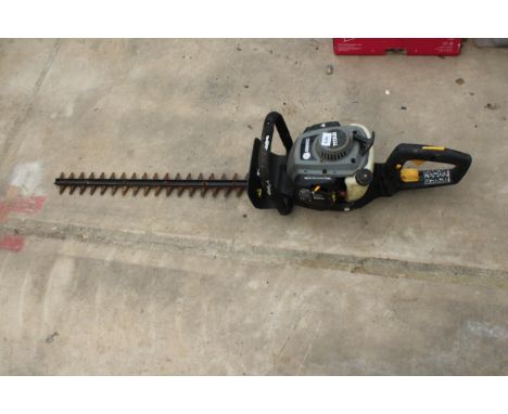A TITAN PETROL ENGINE HEDGE TRIMMER 