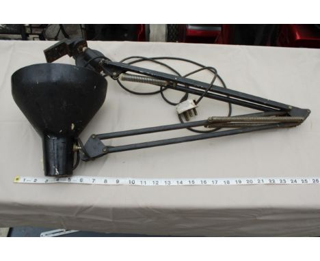 A VINTAGE AND RETRO BENCH MOUNTED ANGLE POISE LAMP 