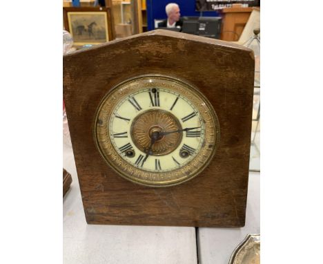 A VINTAGE BRASS AND ENAMEL FACED AMERICAN MANTLE CLOCK, 'ANSONIA NEW YORK', WITH KEY, VENDOR STATES WORKING ORDER, NO WARRANT