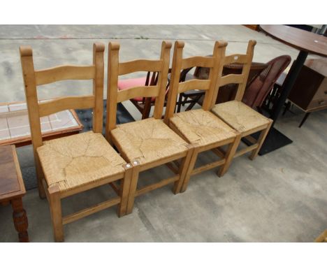 A SET OF FOUR LADDER-BACK RUSH SEATED DINING CHAIRS 