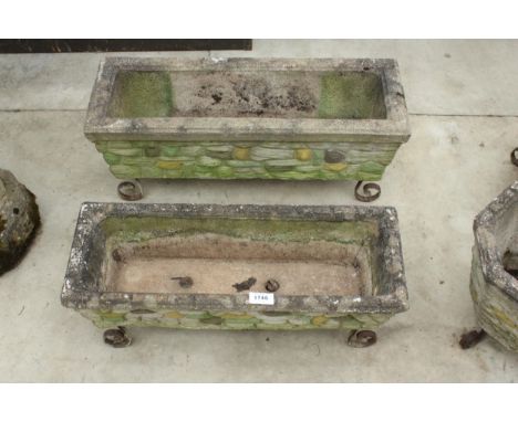 TWO CONCRETE TROUGH PLANTERS WITH METAL LEGS 