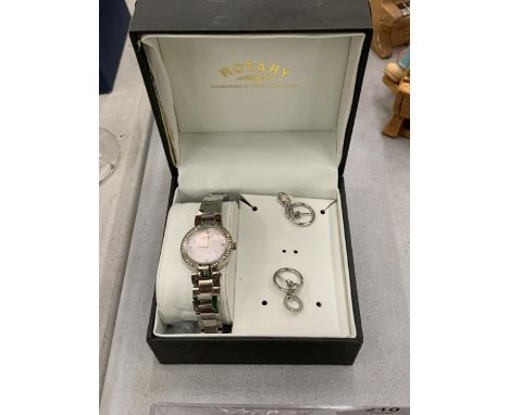 A ROTARY LADIES WRISTWATCH WITH MOTHER OF PEARL FACE AND METAL STRAP, TOGETHER WITH A PAIR OF EARRINGS IN A PRESENTATION BOX 