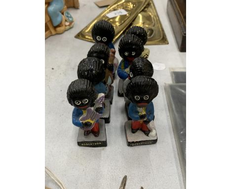 EIGHT VINTAGE ROBERTSONS BAND MEMBERS TO INCLUDE THE SINGER Notice from the the-saleroom.com: These items are listed on the b