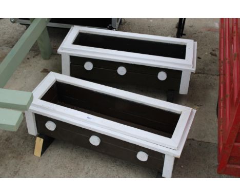 A PAIR OF SMALL WOODEN TROUGH PLANTERS 