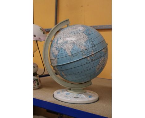 A LARGE 1960'S METAL ROTATING SCHOOL GLOBE ON A BASE, HEIGHT APPROX 30CM 