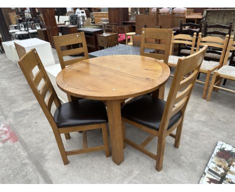 A 'MORRIS FURNITURE' OAK EXTENDING DINING TABLE, 43" DIAMETER (LEAF 16") AND FOUR LADDER-BACK DINING CHAIRS 