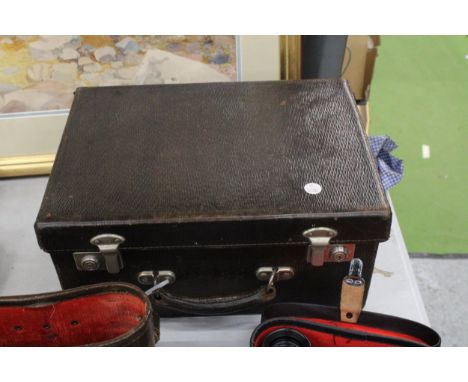 A VINTAGE FILING SYSTEM IN A SUITCASE 