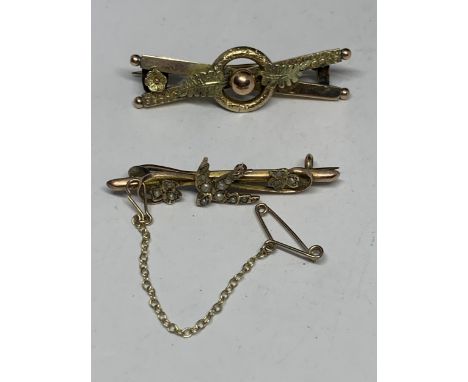 TWO VINTAGE MARKED 9 CARAT GOLD BROOCHES ONE WITH A SEED PEARL SWALLOW DESIGN AND SAFETY CHAIN 