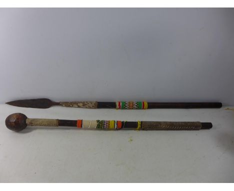 A ZULU KNOBKERRIE WITH BEADWORK DECORATION, LENGTH 81CM (A/F), AND AN ASSEGAI SPEAR, LENGTH 99CM (A/F) 