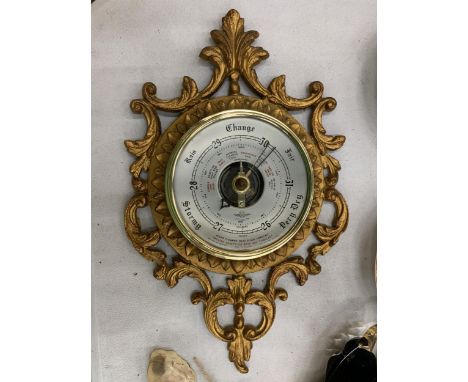 A VINTAGE GILT BAROMETER 