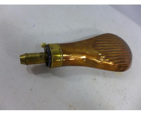 A COPPER AND BRASS POWDER FLASK 