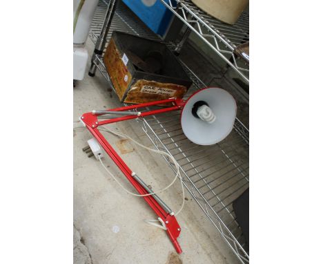 A RED ANGLE POISE LAMP, A VINTAGE TIN AND A PAIR OF ROLLER SKATE SHOE ATTATCHMENTS 
