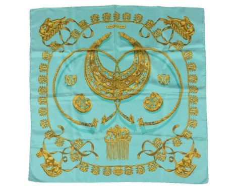 Hermes, Les Cavaliers D'or, a silk scarf, with a mint green background with gold jewellery decoration, with rolled edges, 89c