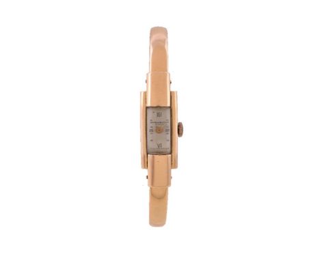 Baume & Mercier, an 18 carat gold bangle wristwatch, no. 101246, manual wind movement, 17 jewels, cal. 746, silvered dial, Ro