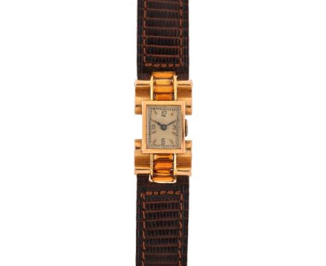 An 18 carat gold and citrine wristwatch, circa 1950, no. 349, Swiss manual wind movement, silvered dial, Arabic numerals and 